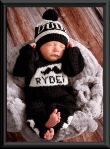 Baby boy in black and white custom knit mustache sweater and leggings